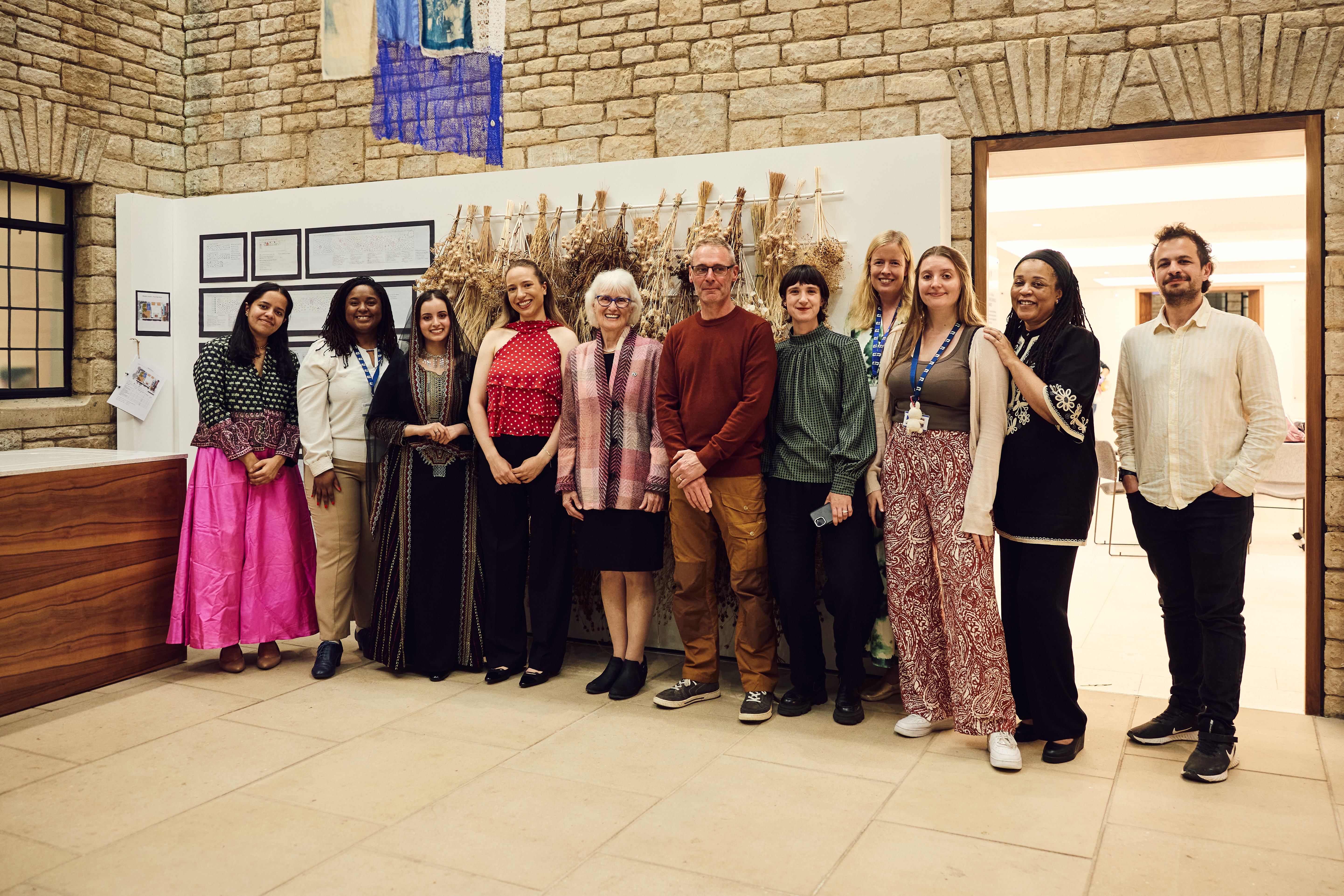 The artists and staff standing in a row