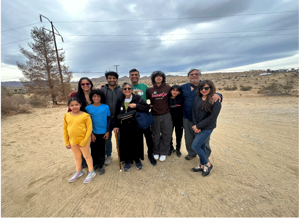 Jahar and Sunita with their family in the Joshua Tree Park. 