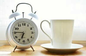 Image of a clock and a mug.