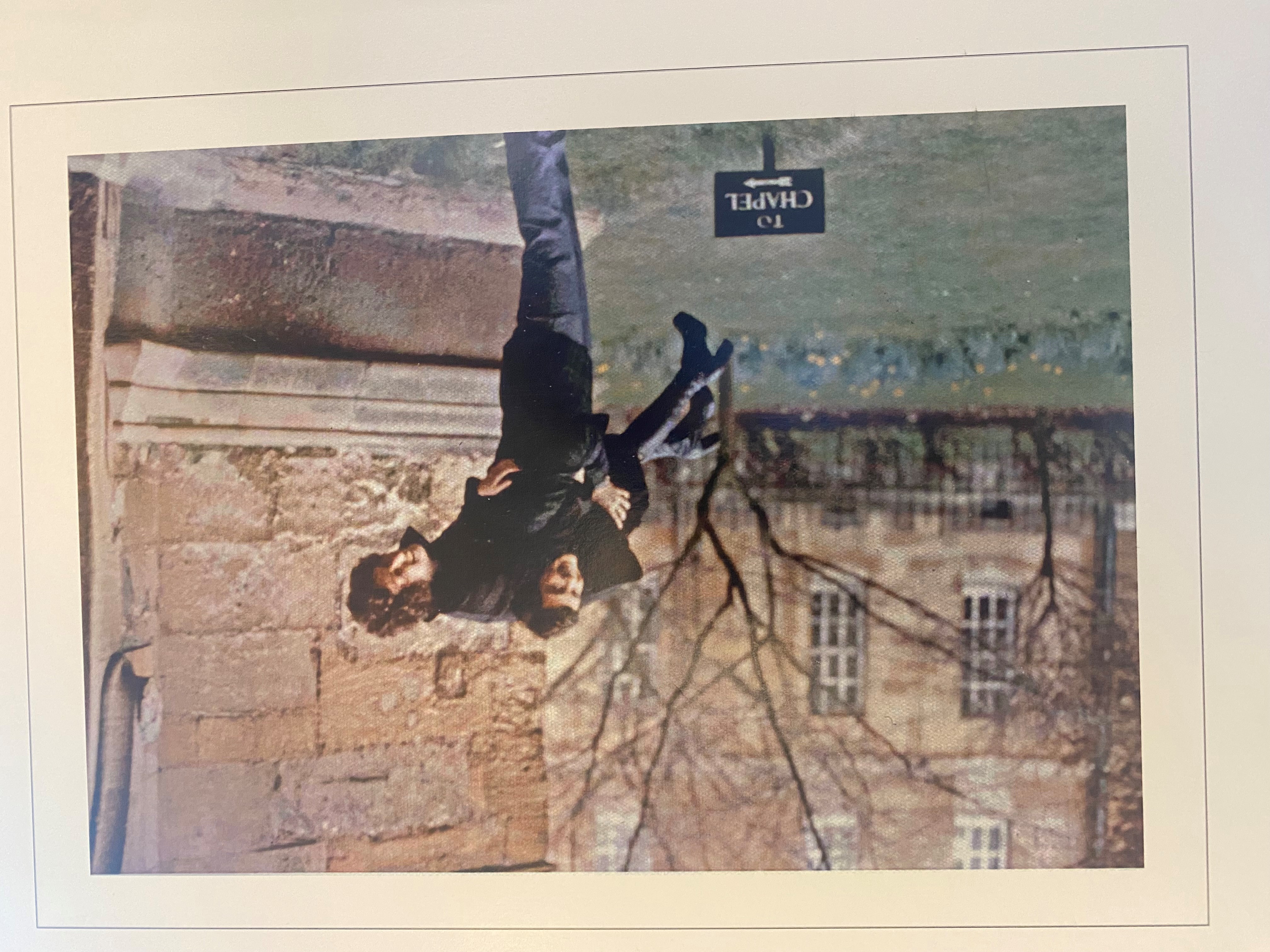 Photo of Nick and Marla smiling, with Nick holding Marla up over his shoulder.
