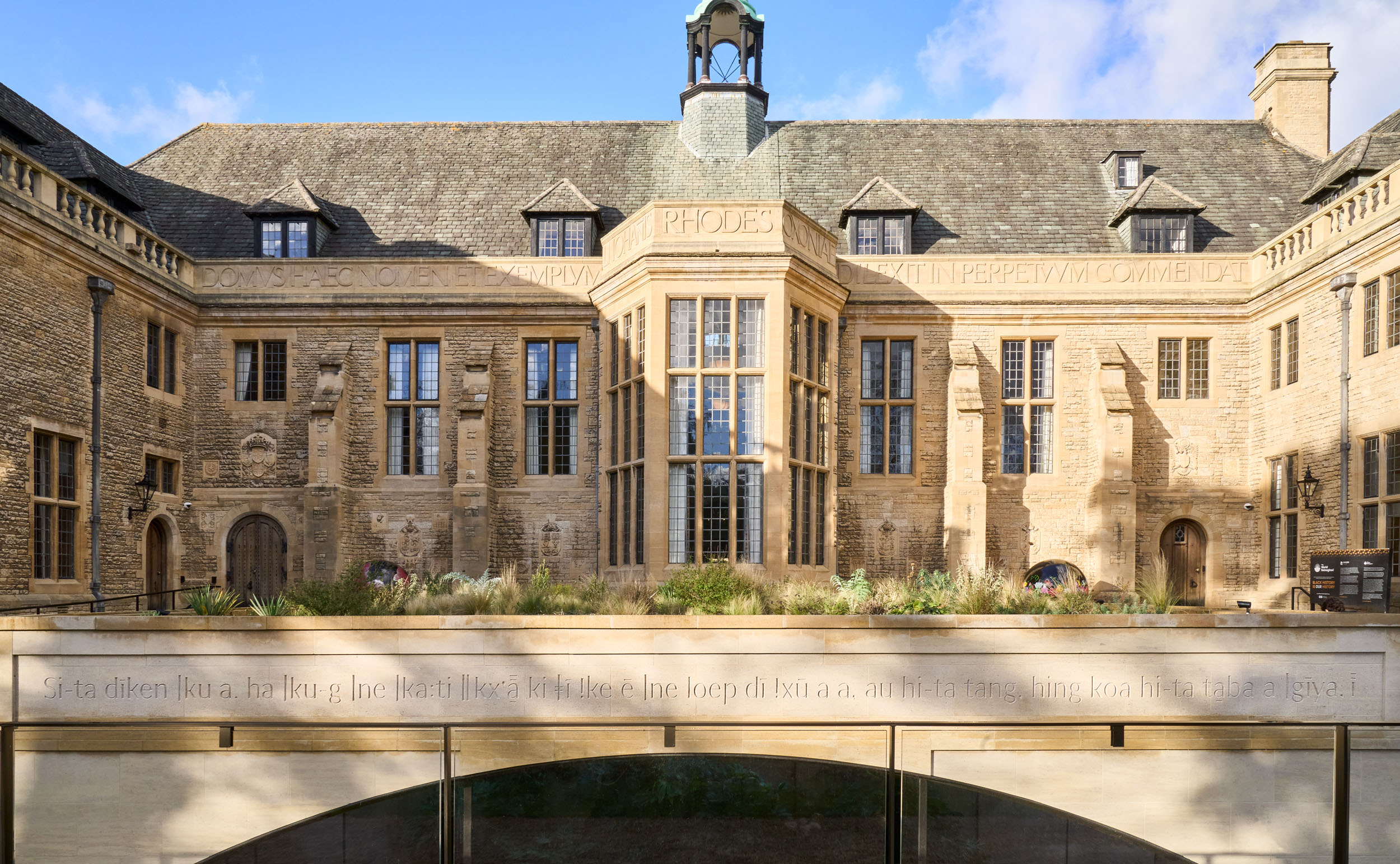 Parapet inscription in |xam on Rhodes House south facade