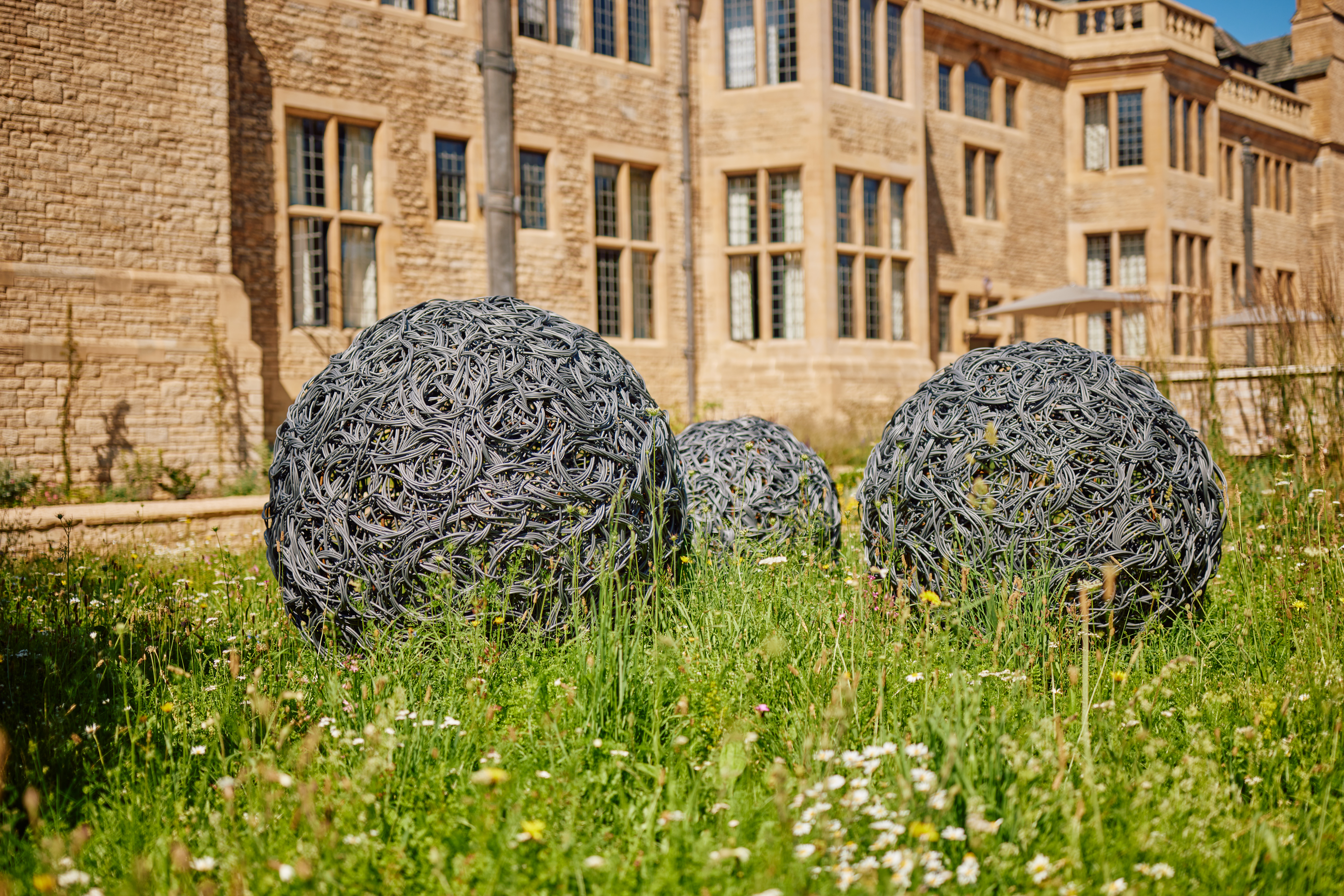 Image of Gogel Garden sculptures which are 2 round metallic balls