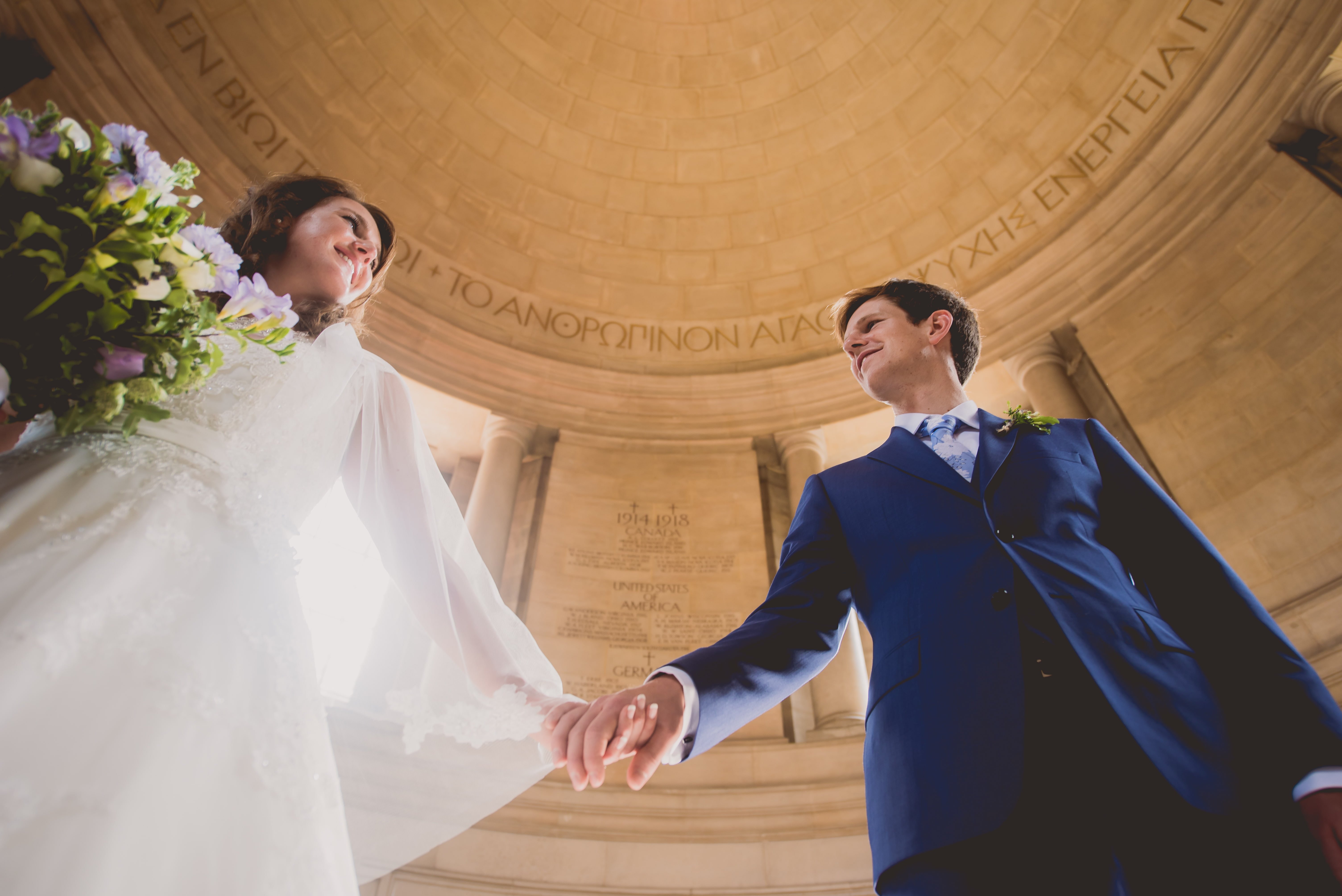 Wedding Couple holding hands in the Rotunda