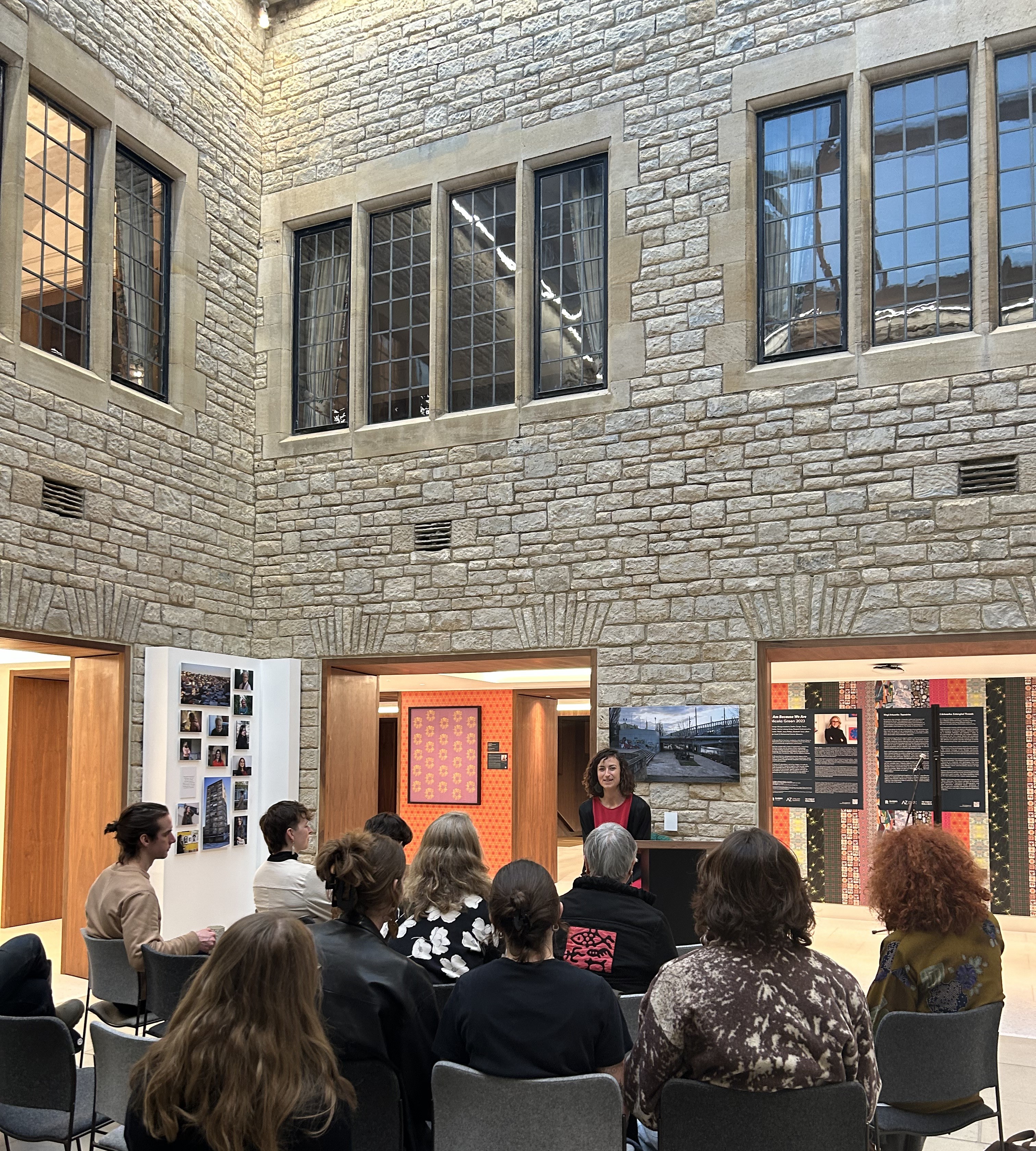 Small meeting in the Rhodes House Conference Foyer Lightwell