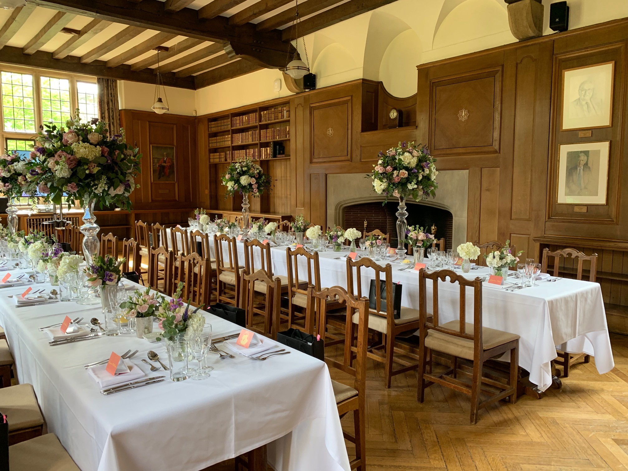 Rhodes House Beit Room set up for a dinner with two banquet tables