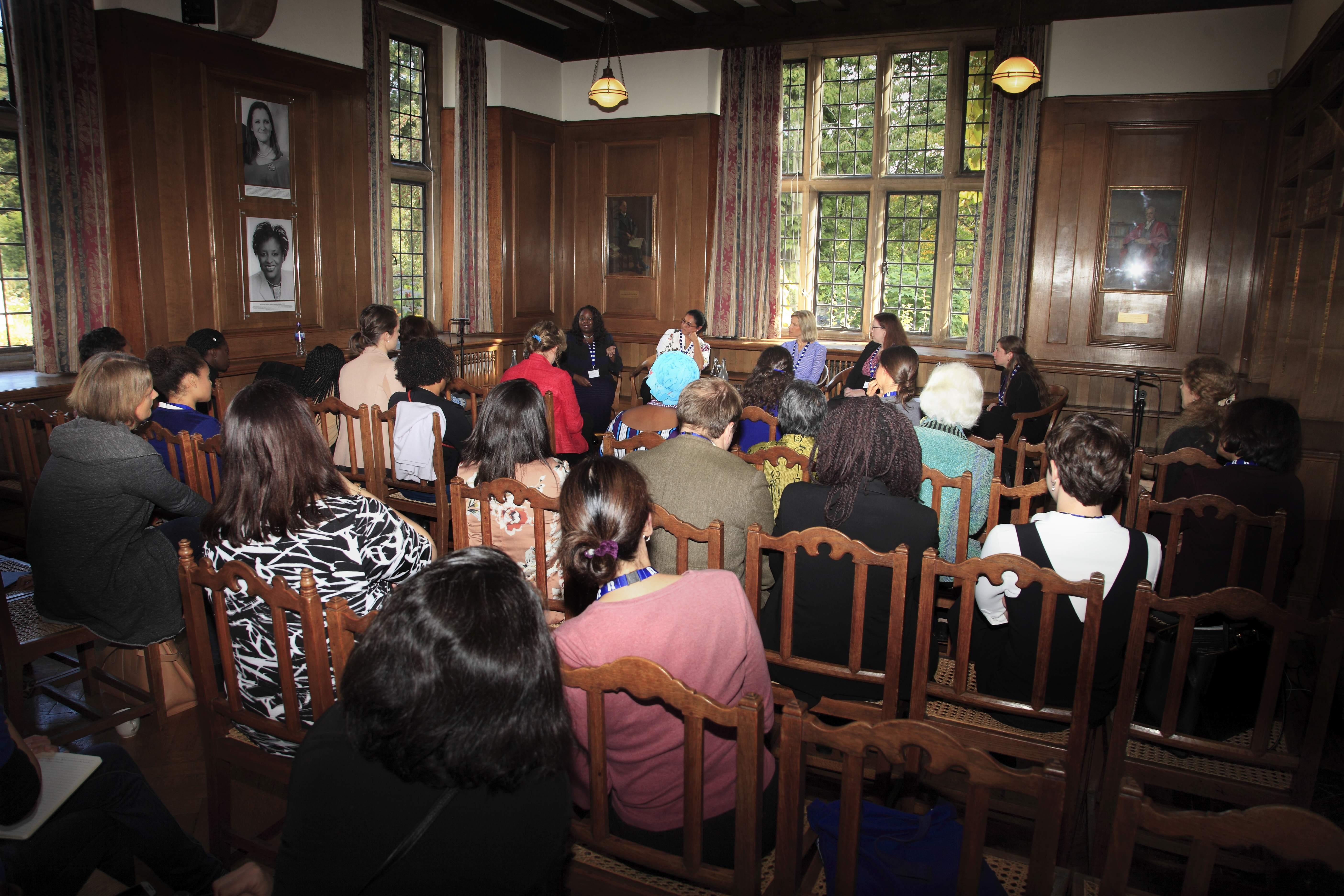 Talk in the Rhodes House Beit Room with guests facing a panel of seated speakers