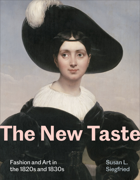 Front cover of Susan's book titled 'The New Taste'. The text below reads 'Fashion and Art in the 1820s and 1830s'. The cover is of a lady in a black and white dress, wearing a large black hat with a white feather in it.