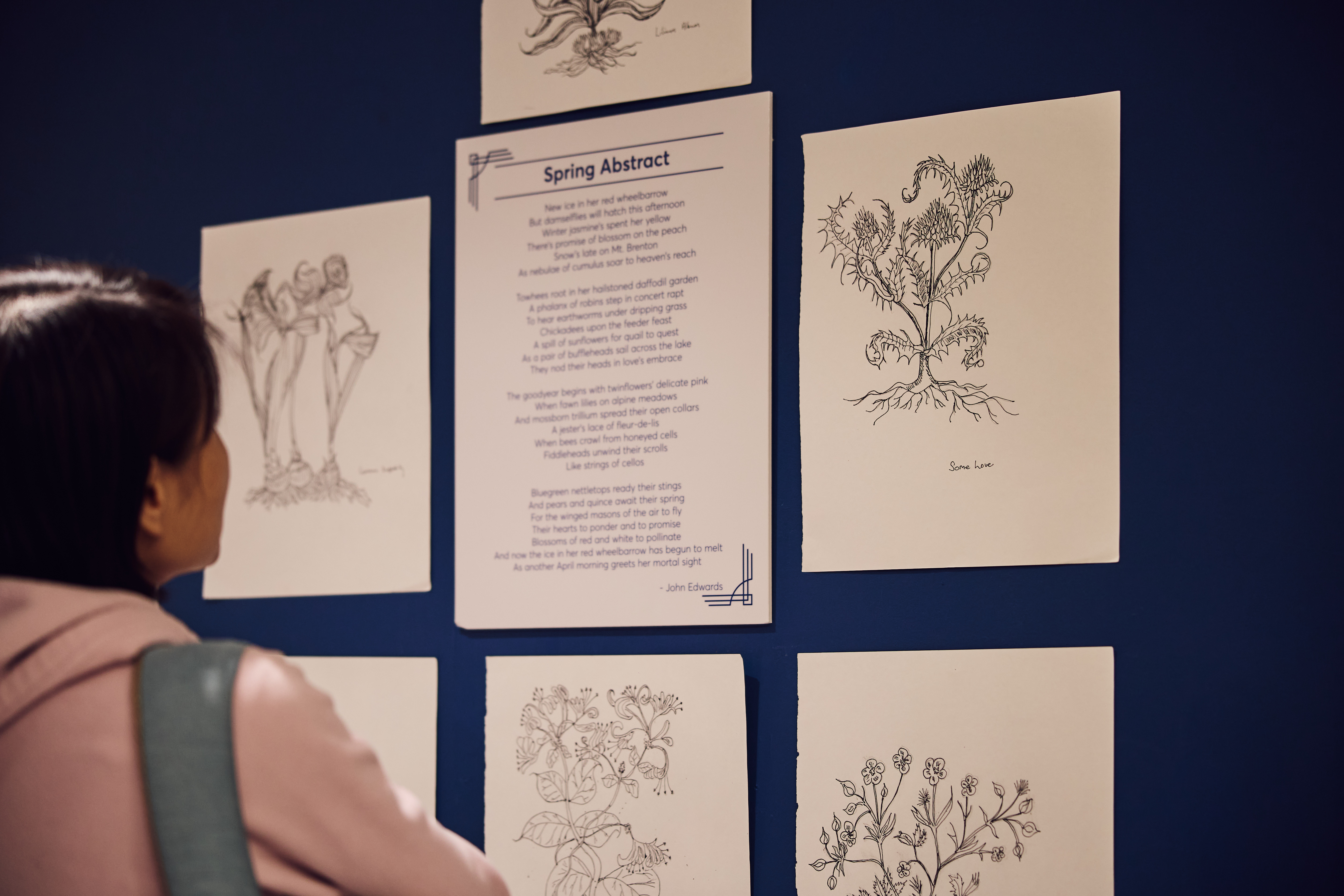 Someone looking at drawings