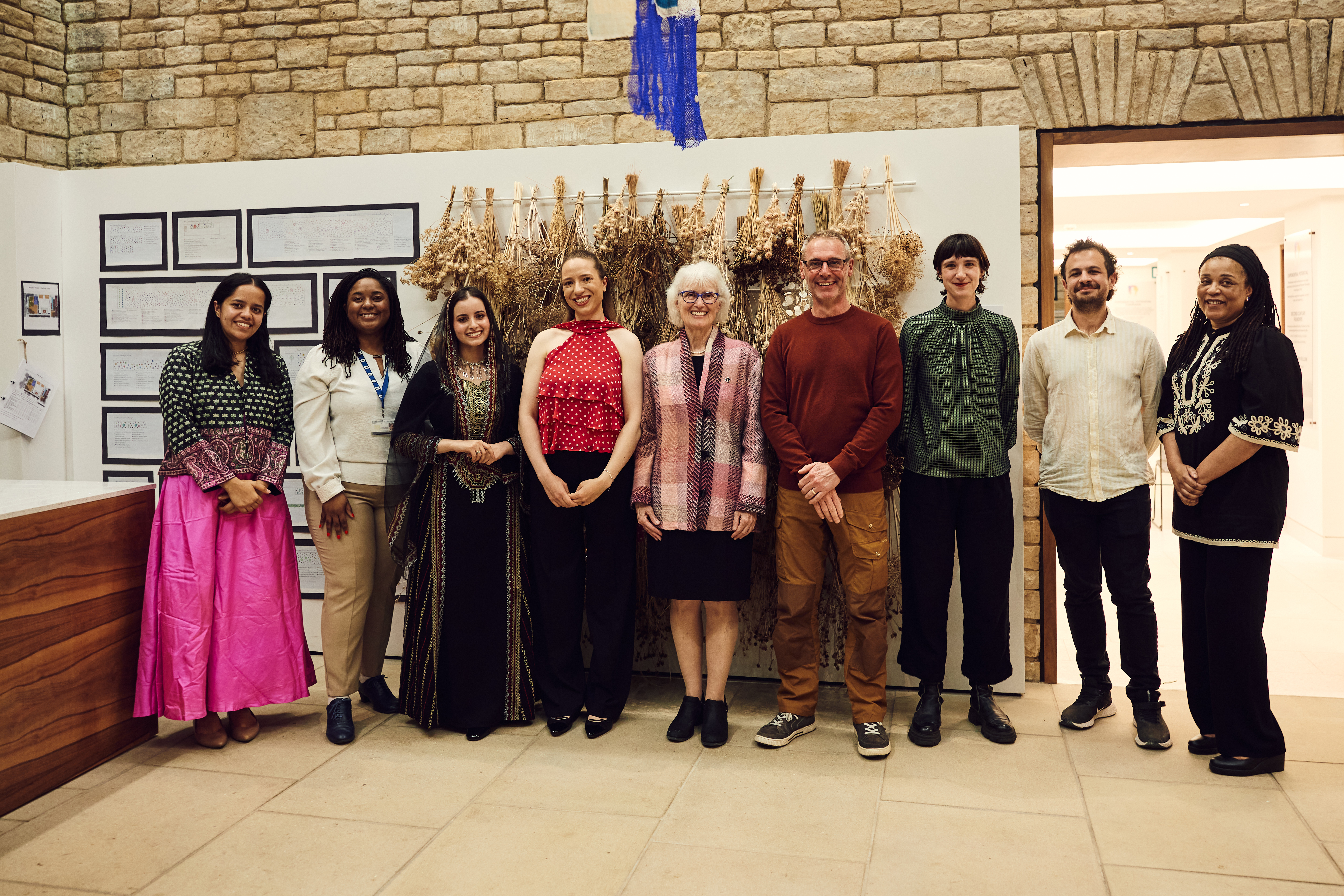 The artists standing in a row
