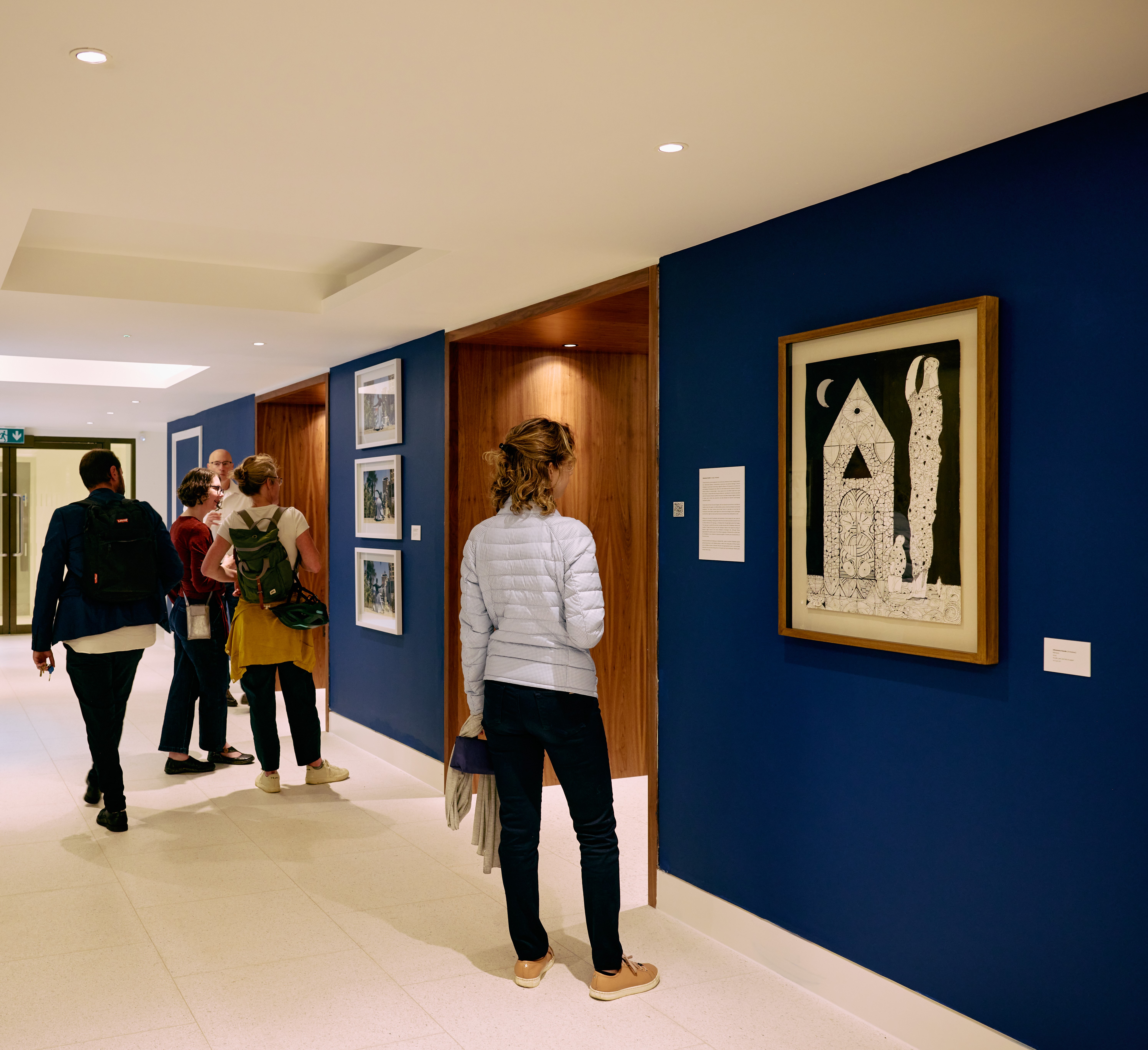 Visitors viewing the Entangled art exhibition