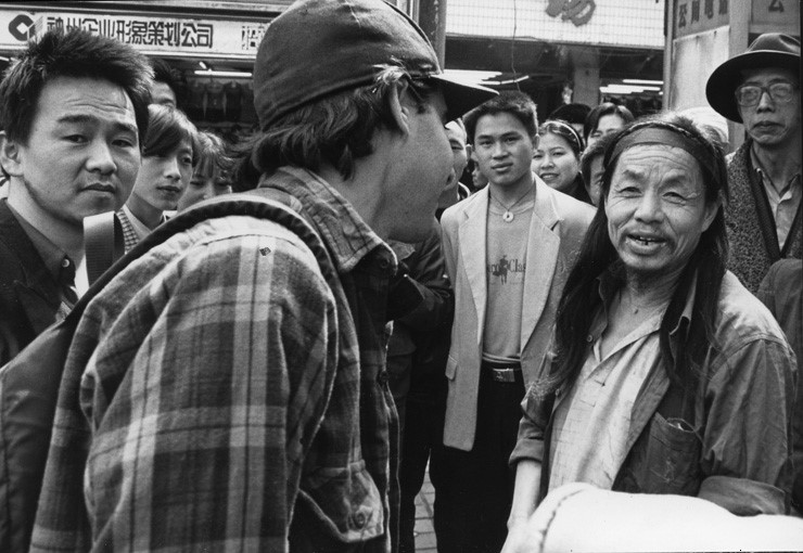 Peter Hessler talking on the street in Fuling, China, in 1998