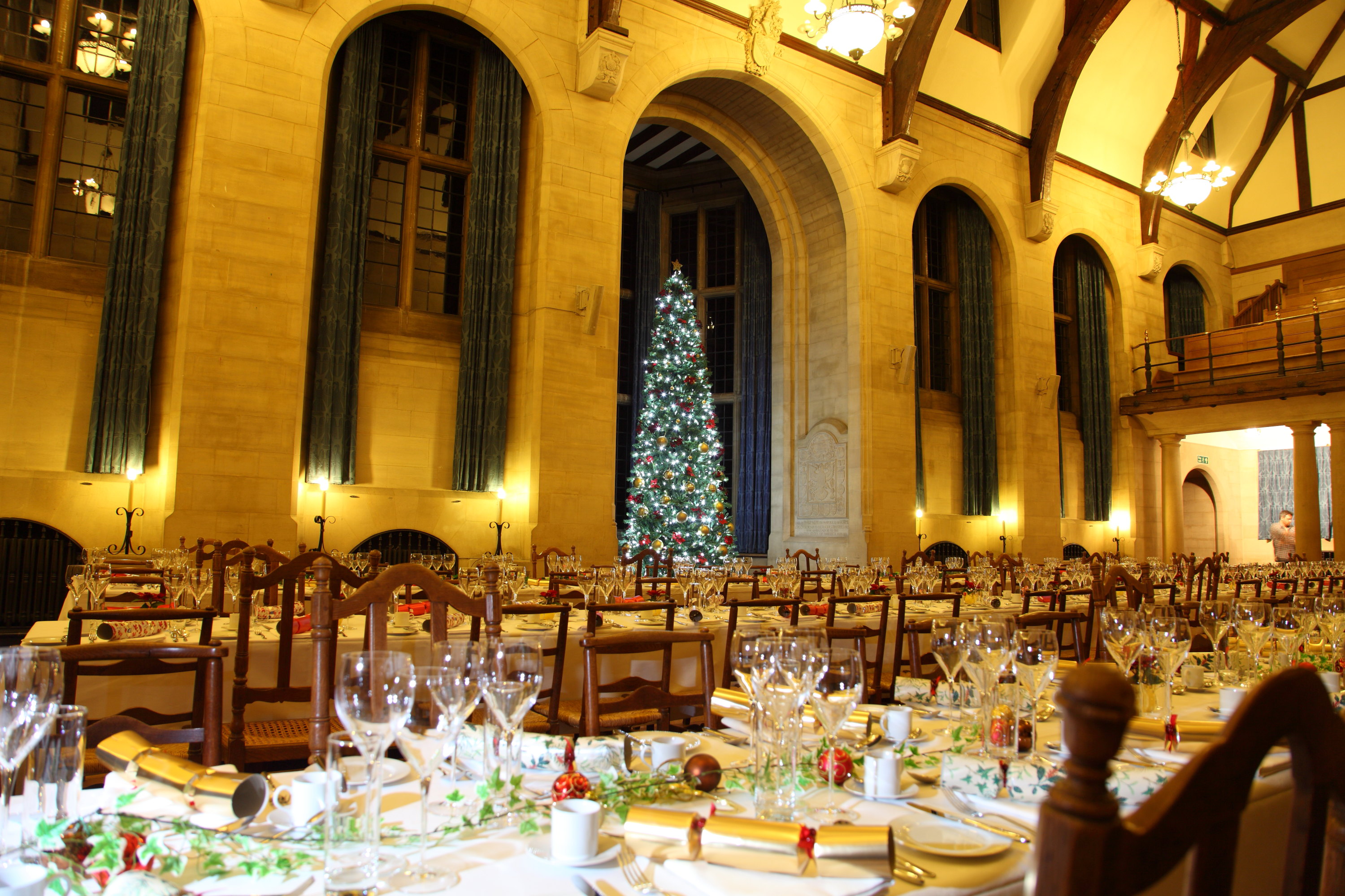 Rhodes House McCall MacBain Hall Christmas tree and dining tables set for Christmas party.