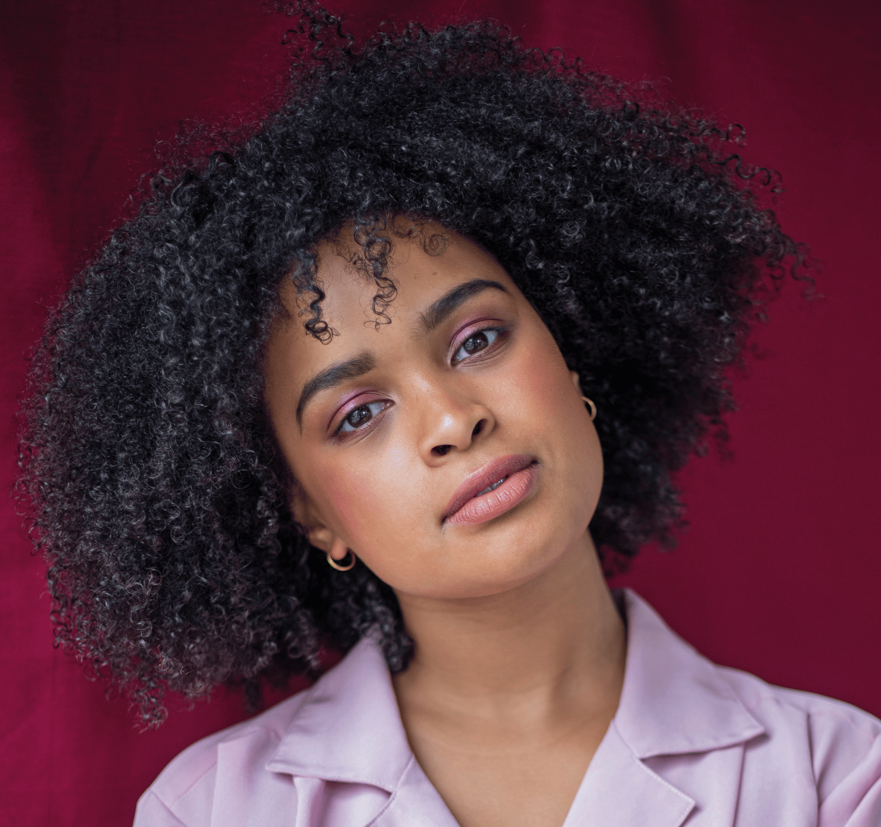 A headshot of Rebecca wearing a lilac shirt