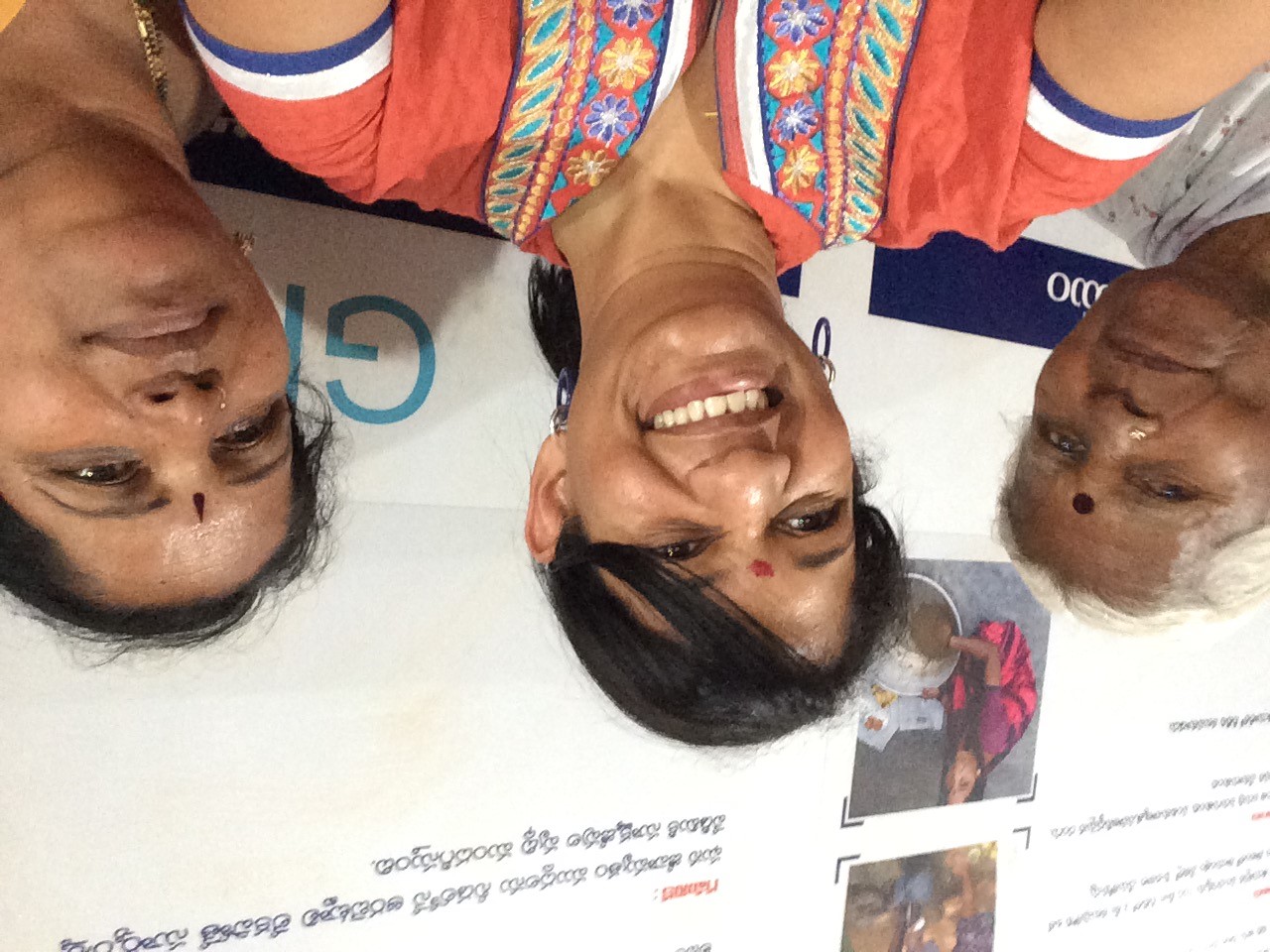 Selfie of Sherry-Lee in the middle, smiling.