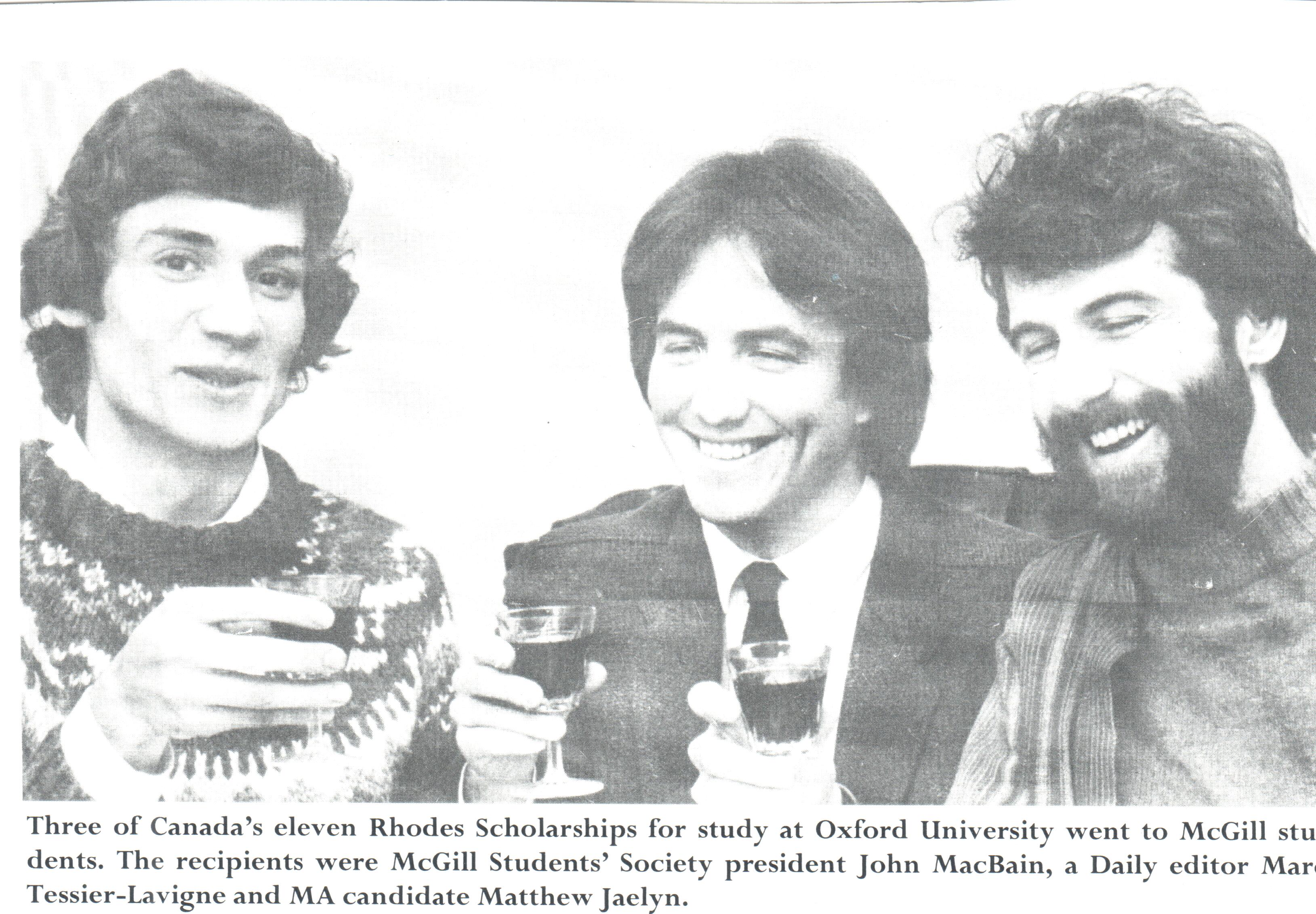 Black and white newspaper clipping. It pictures three young Scholars holding glasses of port, and John smiling in the middle. The text below reads: "Three of Canada's eleven Rhodes Scholarships study at Oxford University went to McGill students. The recipients were McGill Students' Society president John MacBain, a Daily editor Marc Tessier-Lavigne and MA candidate Matthew Jaelyn."