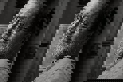 Black and white photograph of Boris turning to his side to look at the camera