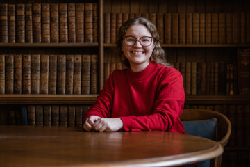 A Scholar sitting in Rhodes House