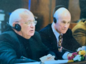The picture shows Joseph seated next to Gorbachev