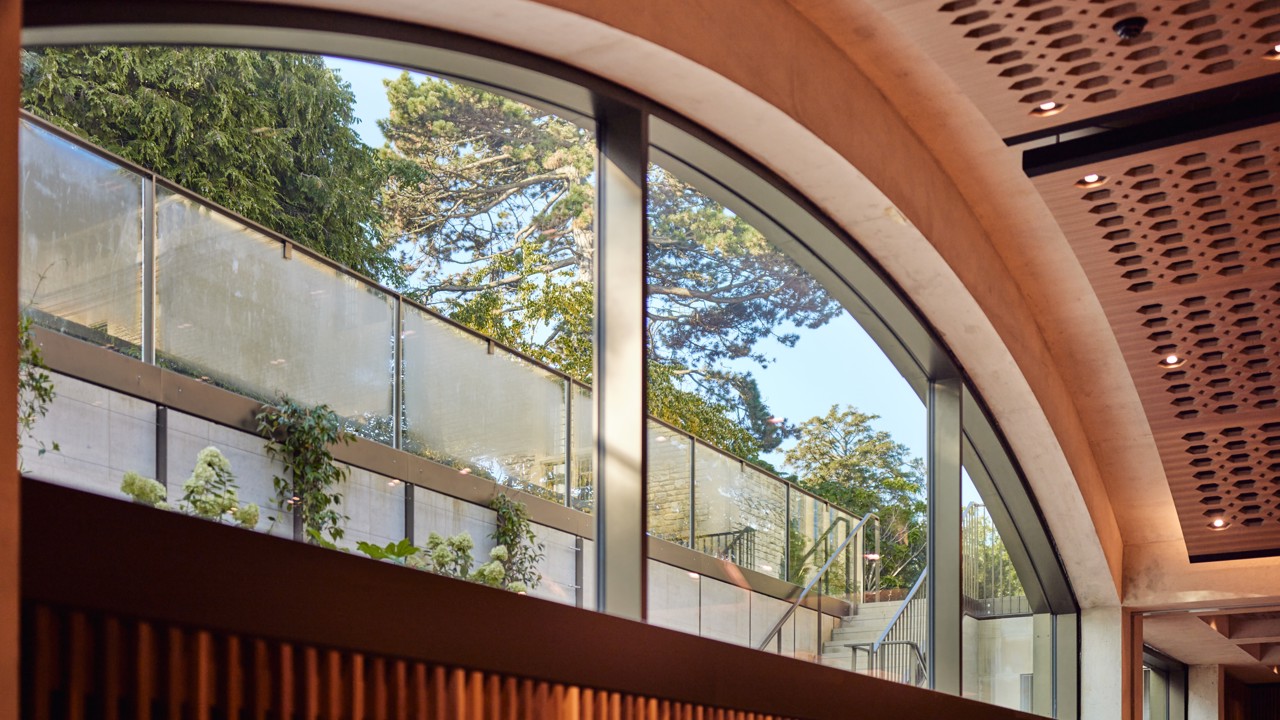 Conference Hall clerestory window looking out to the Rhodes House garden in daylight.