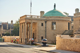 The rotunda at Rhodes House, featuring a sculpture of the Zimbabwe bird atop the copper dome.