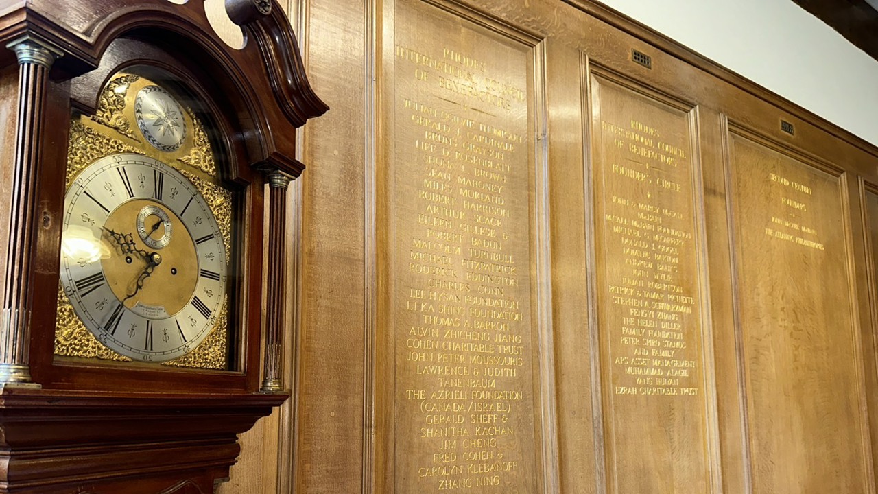 Gold engravings of legacy donors in the Reception Room at Rhodes House