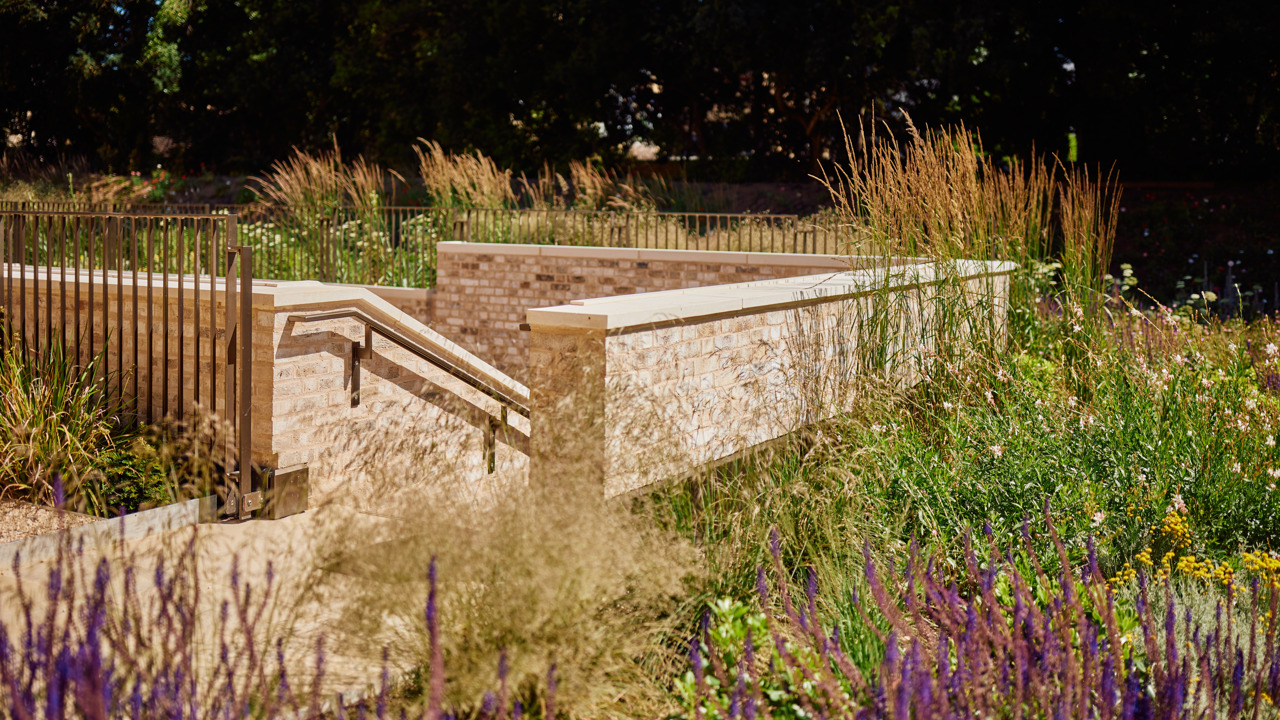 Flowers Overlook The Rhodes Residential Courtyard