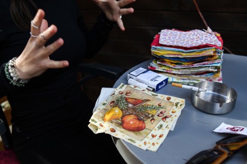 Colourful paper napkins stacked on a table.