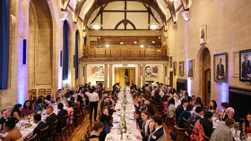 Seated diners at a formal banquet dinner