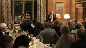 View of a speaker during a formal dinner in the Beit Room.