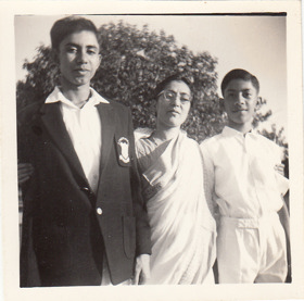 Photo Of My Mother, Brother And Myself (On The Left) Taken When I Was 16 Years Old I Am Wearing A Blazer With The High School's Logo