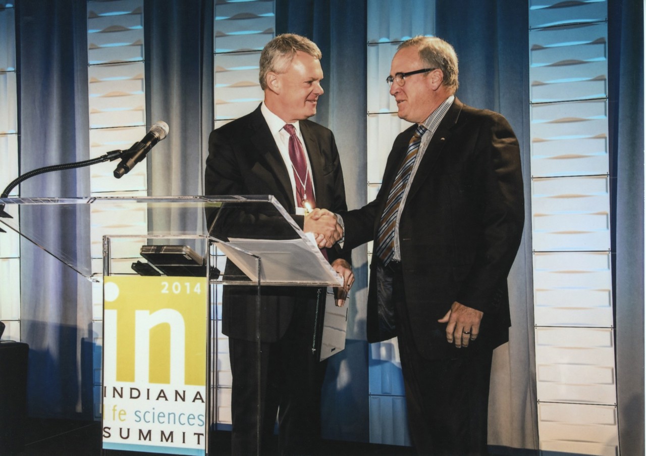 David As President Of Biocrossroads, Giving An Award To The CEO Of Eli Lilly In 2014