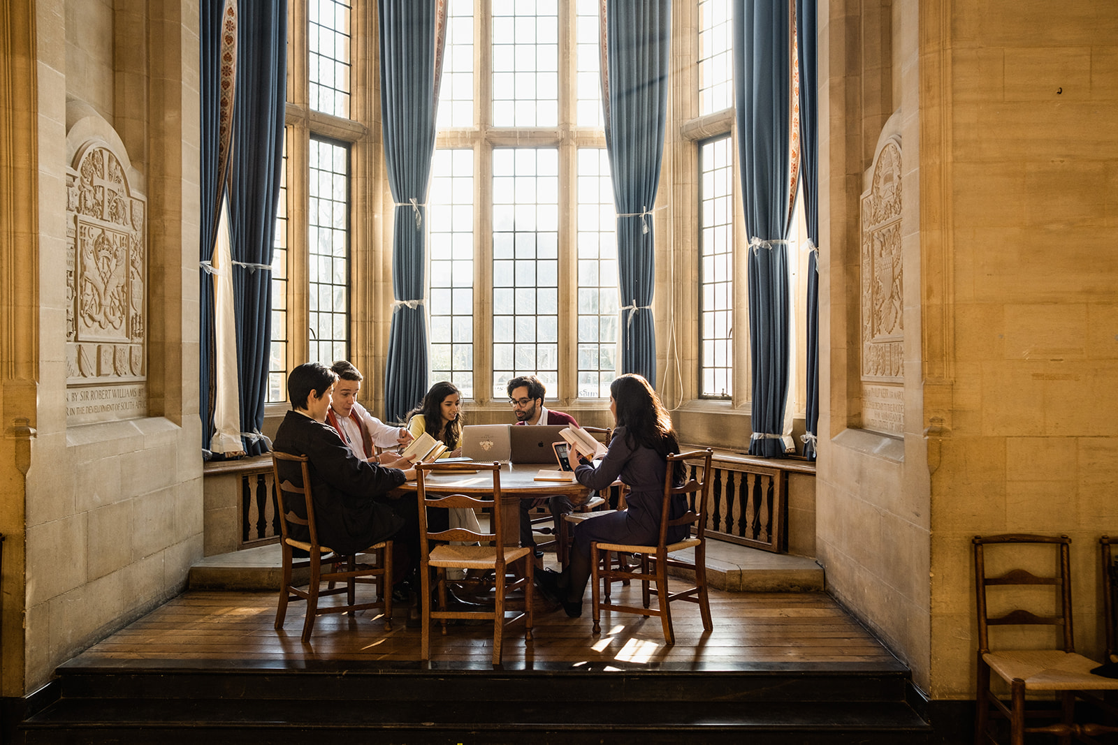A group of Rhodes Scholars studying together at Rhodes House.