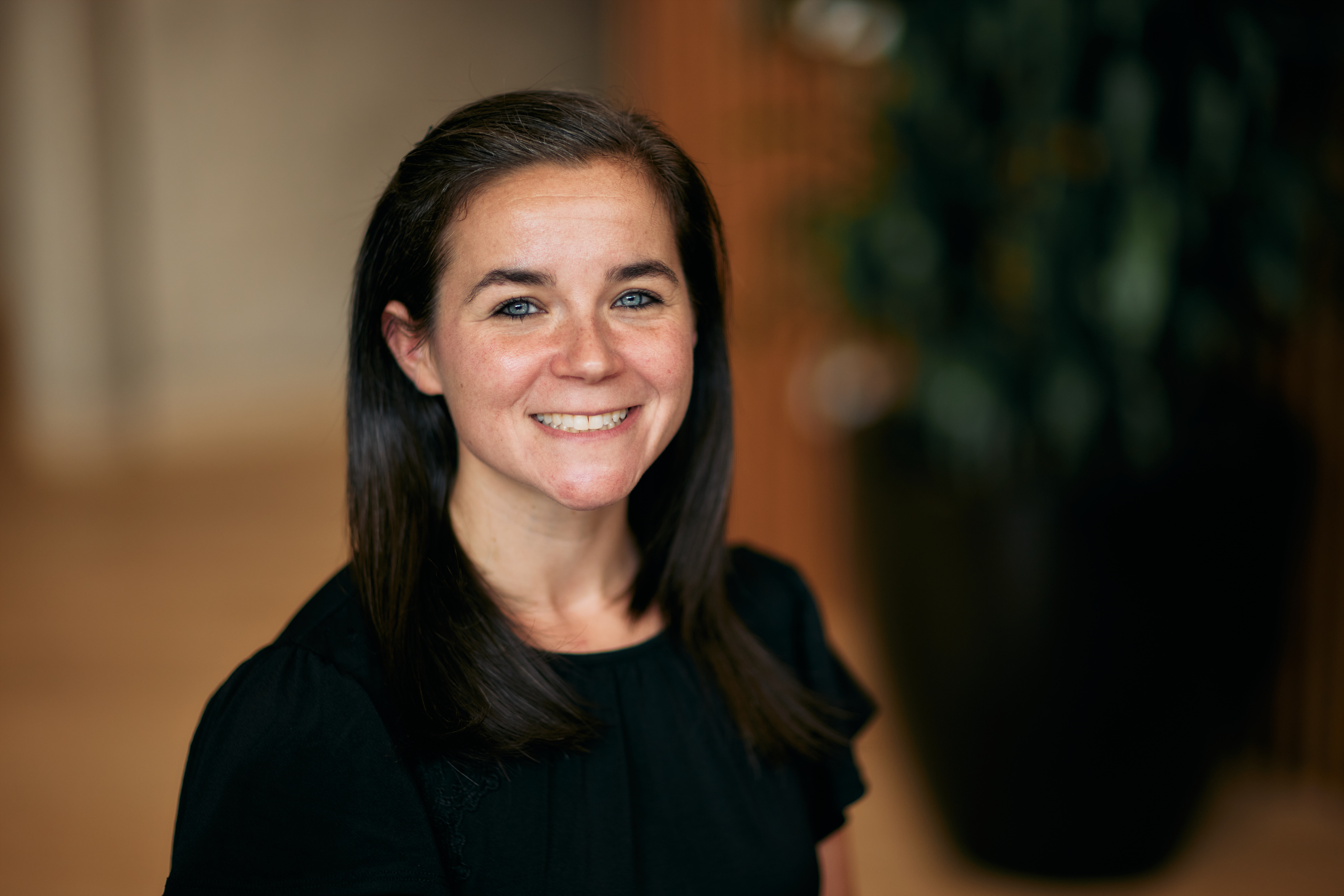 Jamie Byron Geller smiling into camera