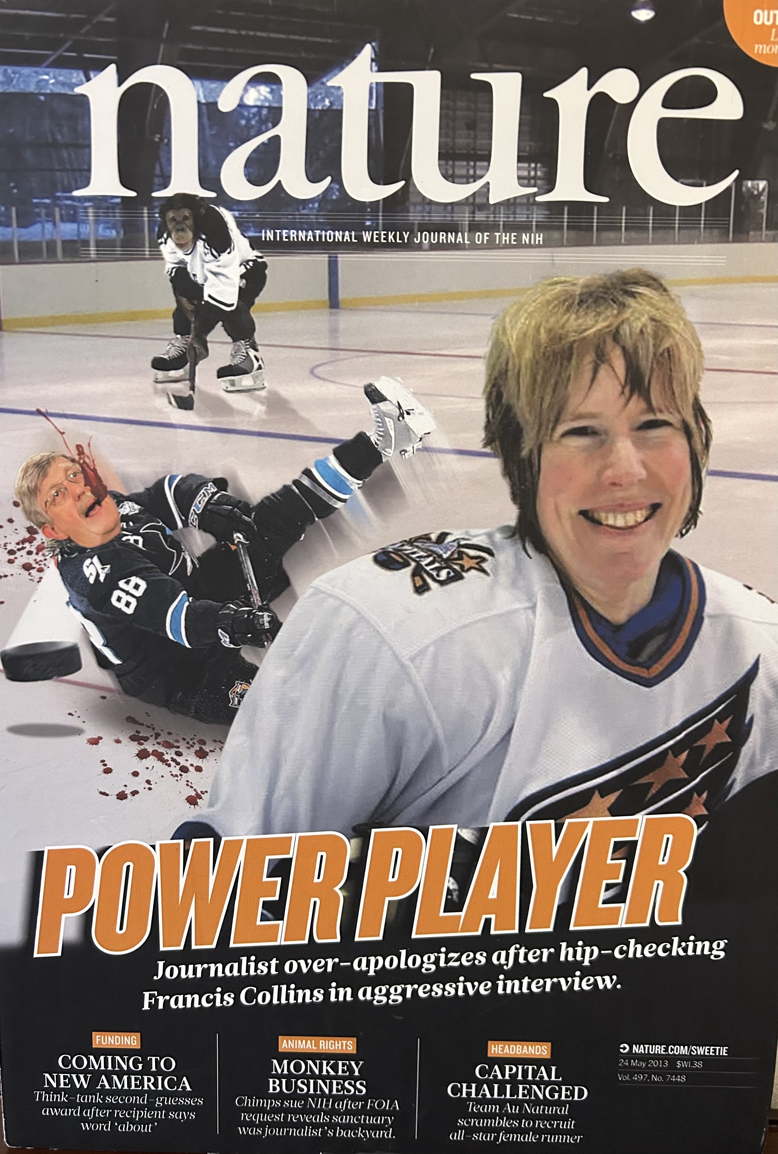 A parody cover of a 'nature' magazine titled 'Power Player: Journalist over-apologizes after hip-checking Francis Collins In aggressive interview'. Meredith is photoshopped wearing an ice hockey top, a man is photoshopped falling behind her afte being hit by a hockey disk, and a monkey holding a hockey stick.