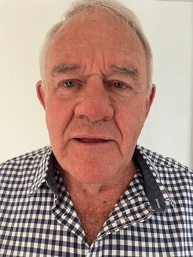 Selfie photo of Tony Saner. He is looking into the camera, wearing a checked shirt.