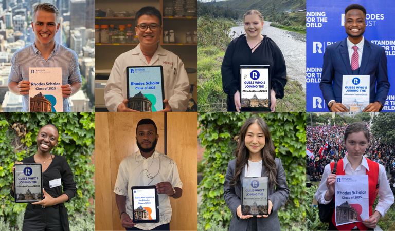 8 members of the class of 2025 holding selection posters