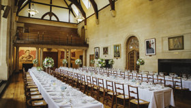 McCall MacBain Hall Wedding Banquet Tables with white flowers courtesy of Gemma Williams Photography