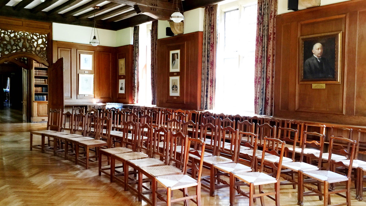 Chairs in a curved arch layout in the Beit Room