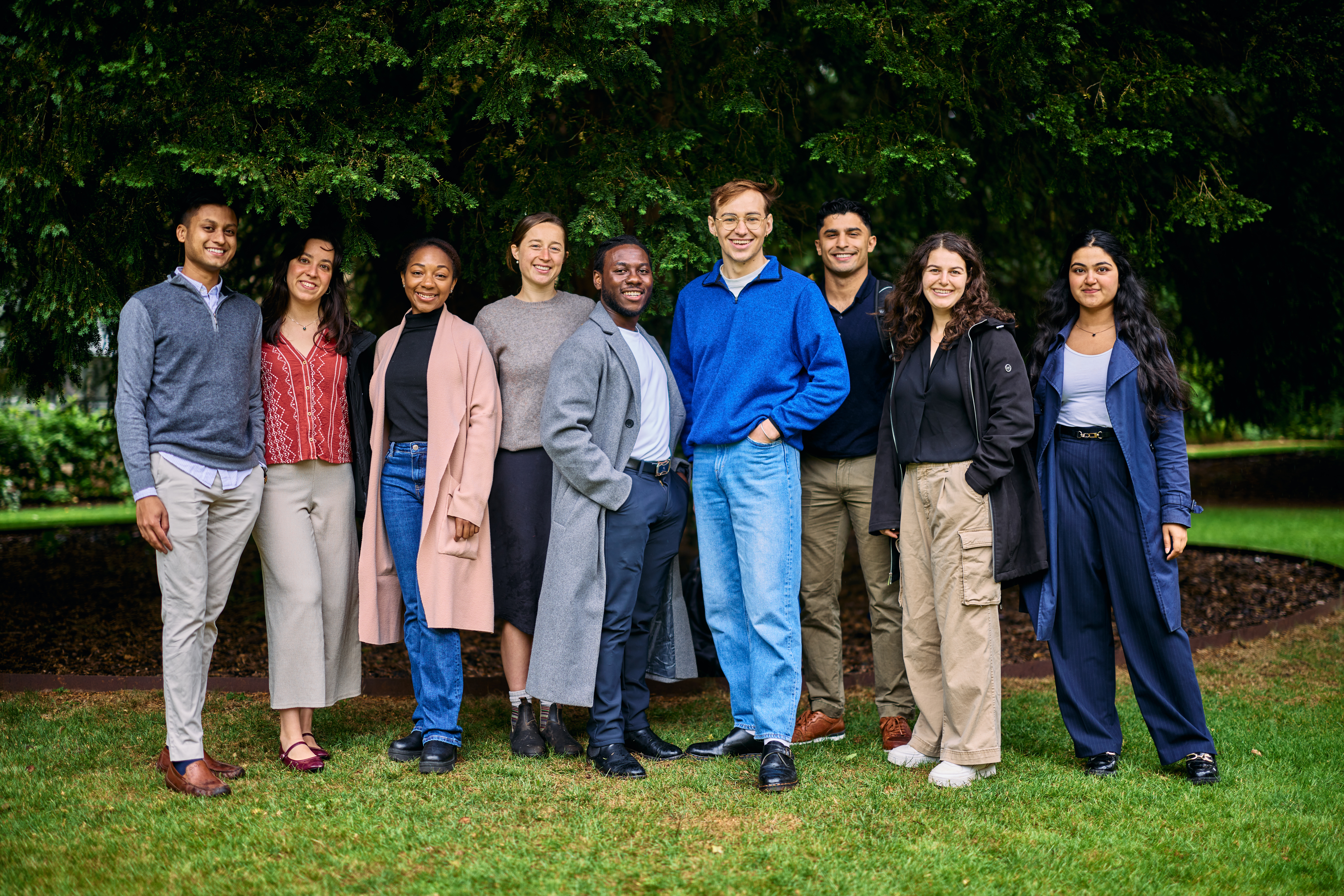 Group photograph of Rhodes Scholars in the garden at Rhodes House.