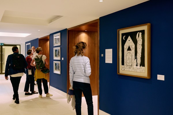 Visitors viewing the Entangled art exhibition