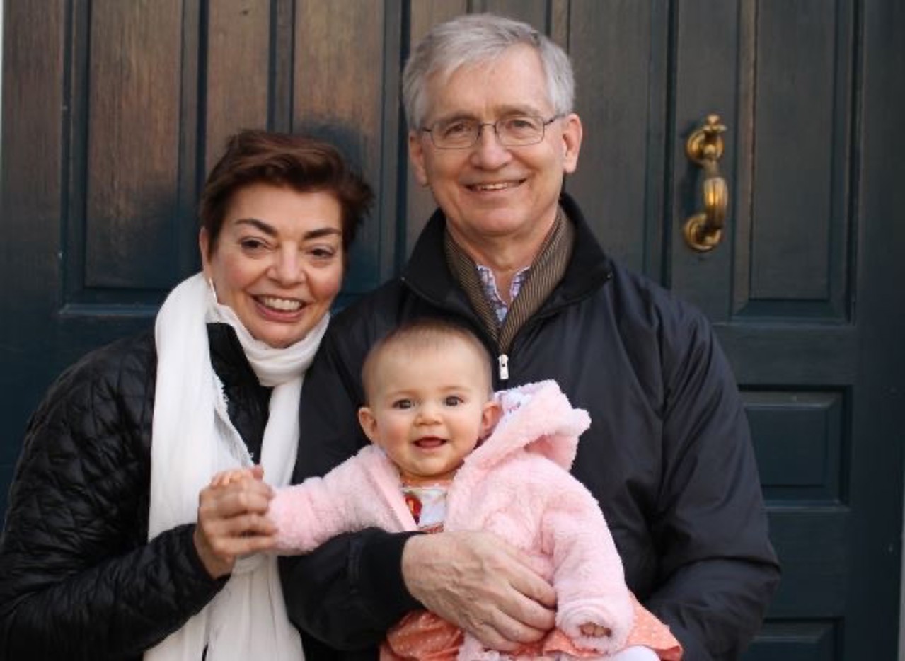 A picture showing Jack and his wife Kathryn holding their grandchild Evelyn