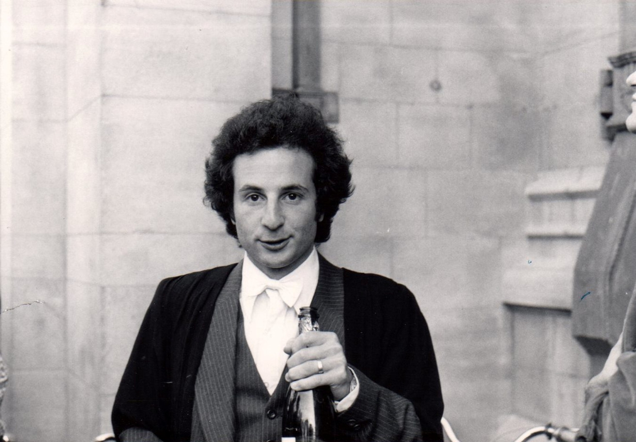1977 At Oxford In Sub Fusc, As David Drinks Champagne On Exiting His Final Exam