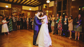 Wedding couple having their first dance in the Rhodes House Beit Room surrounded by guests, photo courtesy Of Gemma Williams Photography