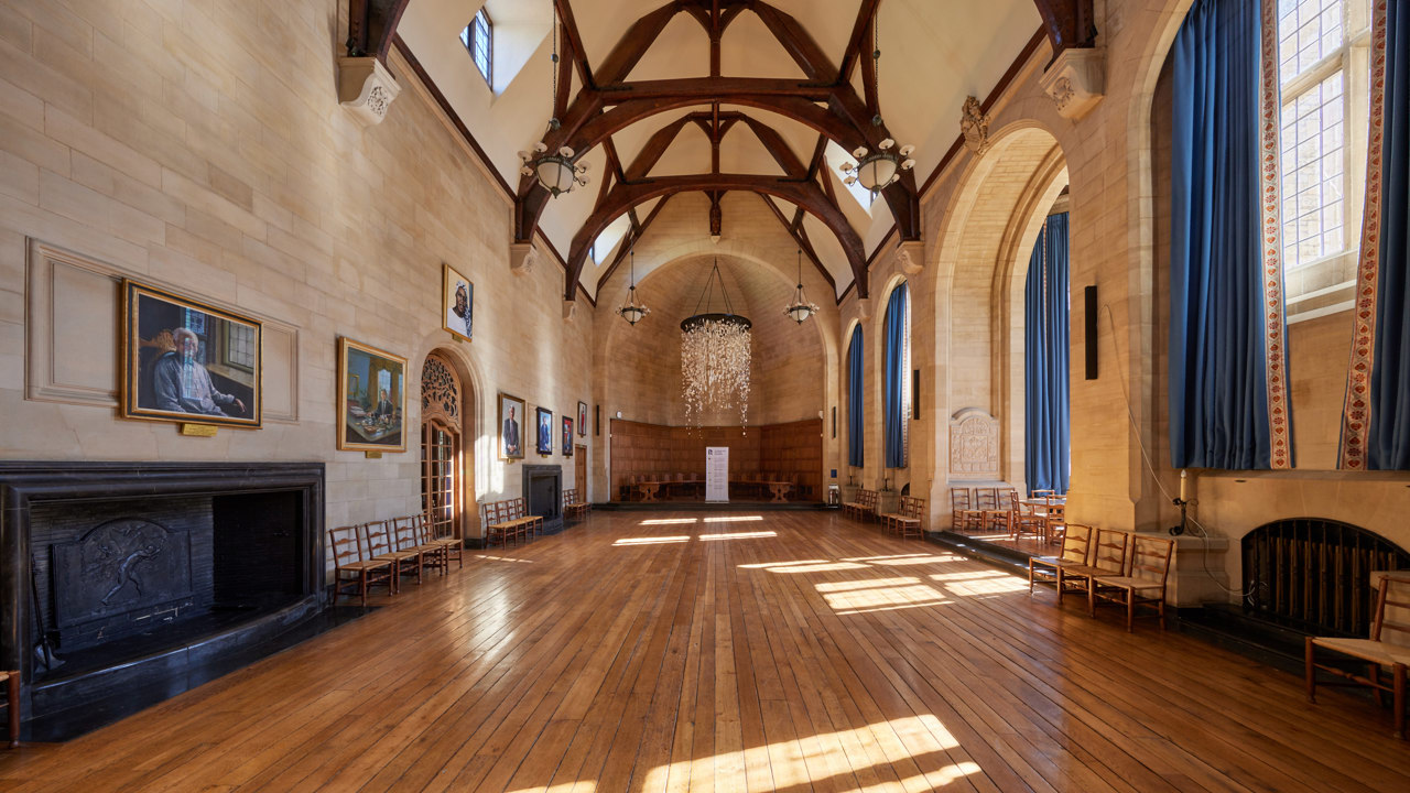 McCall MacBain hall at Rhodes House with the 'Floating Garden' sculpture suspended from the ceiling at the far end.
