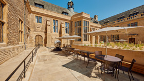 Tables And Sunshades In The Rhodes House Courtyard