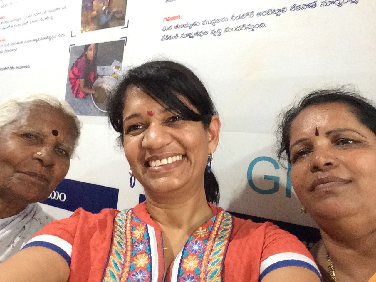 Selfie of Sherry-Lee in the middle, smiling.