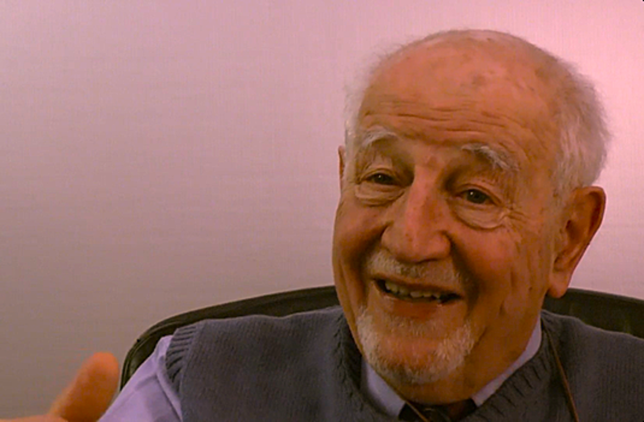 The picture shows an old Guido smiling