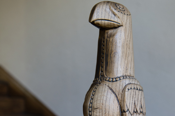 A Zimbabwe Bird newel post on the staircase at Rhodes House